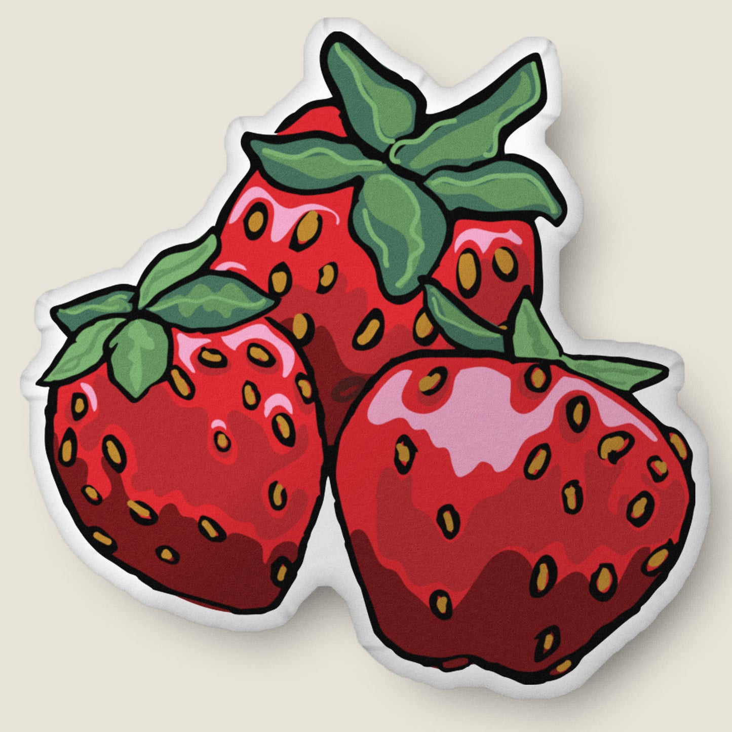 Strawberries-shaped pillow on an ivory background.