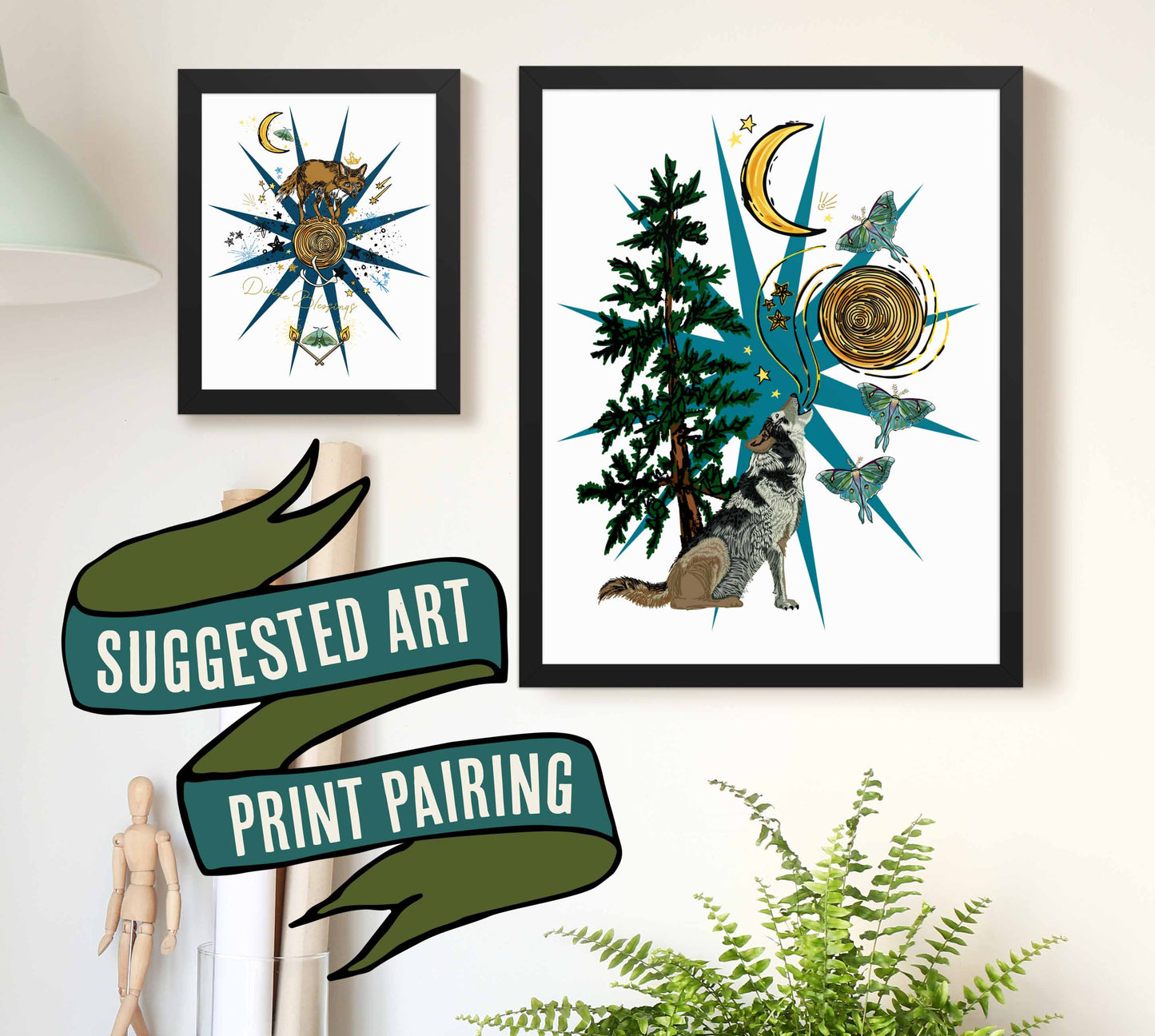 This is a photograph of two framed art prints from the Posh Pad Appalachian Rococo collection with a ribbon stating that this is a suggested art print pairing. The two prints in the photo are the Celestial Fox paired with the Wolf Moon & Moth art print.