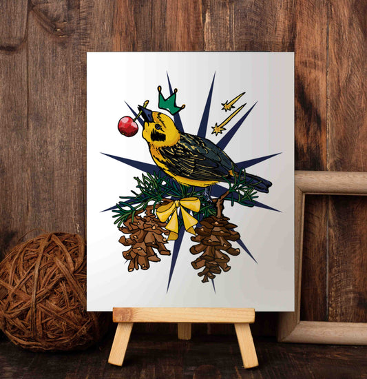 Crowned Golden Finch and Cherry art poster on a wooden easel set against a wood-paneled wall.
