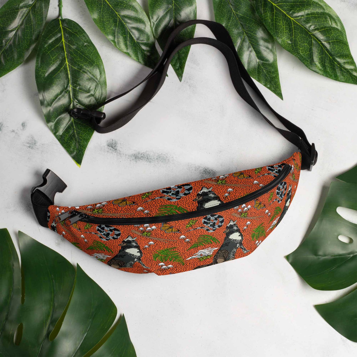 Wild wolf hip pack on a marble table surrounded by leaves.