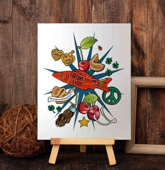 Lucky Charms art poster on a wooden easel set against a wood-paneled wall. The art has a multi-pointed red star in the background. On top of that, there's a red fortune-telling fish and a wild collection of lucky charm icons, including a golden locket that says "you + me", a wishbone, ladybugs, stars, a lucky rabbit's foot, and four-leaf clovers. There are fortune cookies and a fortune that says, "Blessings are all around you".