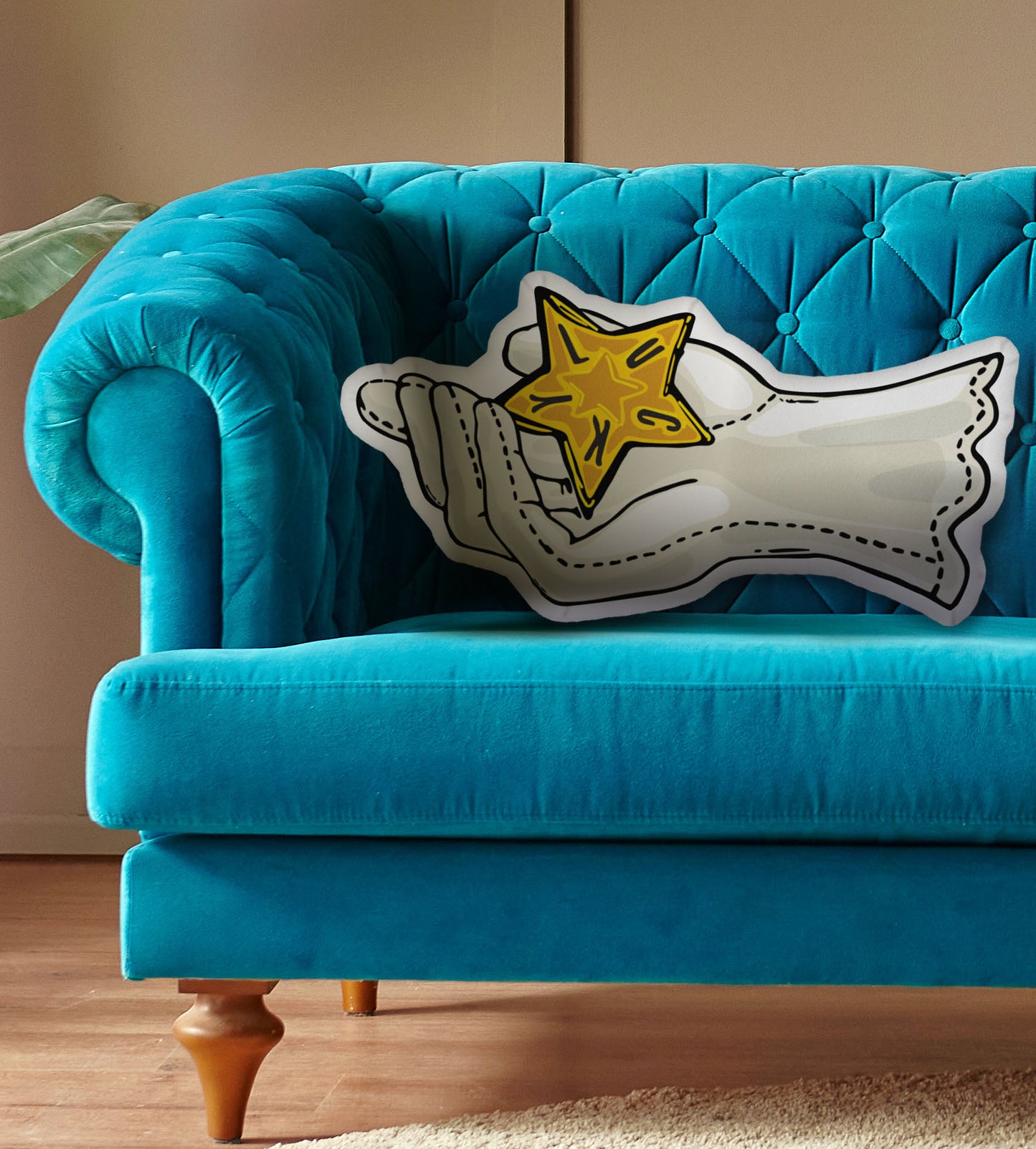 This photo shows the pillow on a bright blue couch.