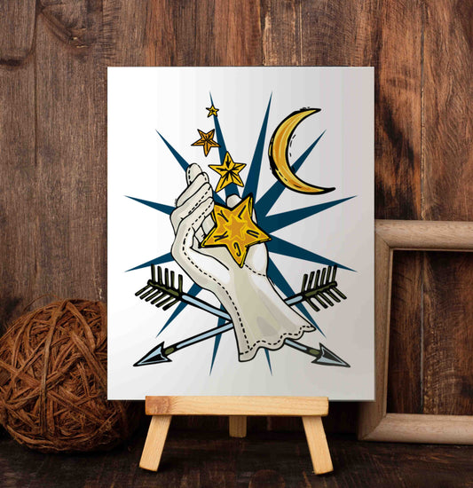 Lucky Star art poster on a wooden easel set against a wood-paneled wall. The art has a multi-pointed blue star in the background. On top of that, there is a white gloved hand releasing lucky stars into the universe. Below that, there are two crossed arrows, a symbol of loyalty and undying friendship. The upper right corner holds a crescent moon.