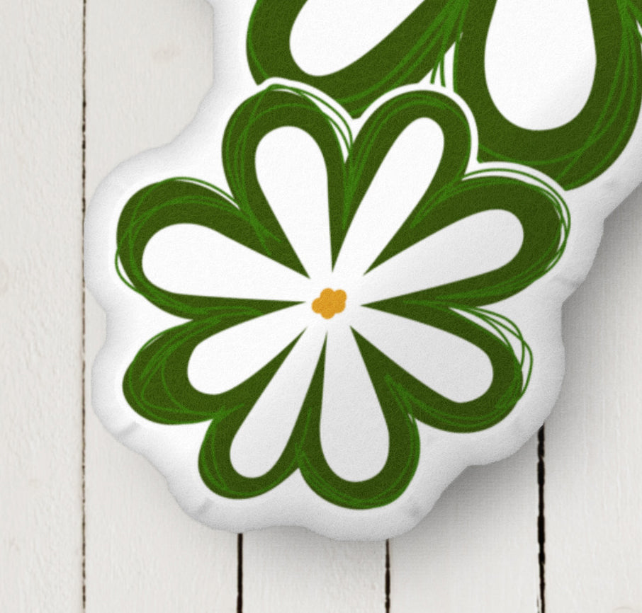 Close-up of the daisy pillow thta shows the velvety texture.