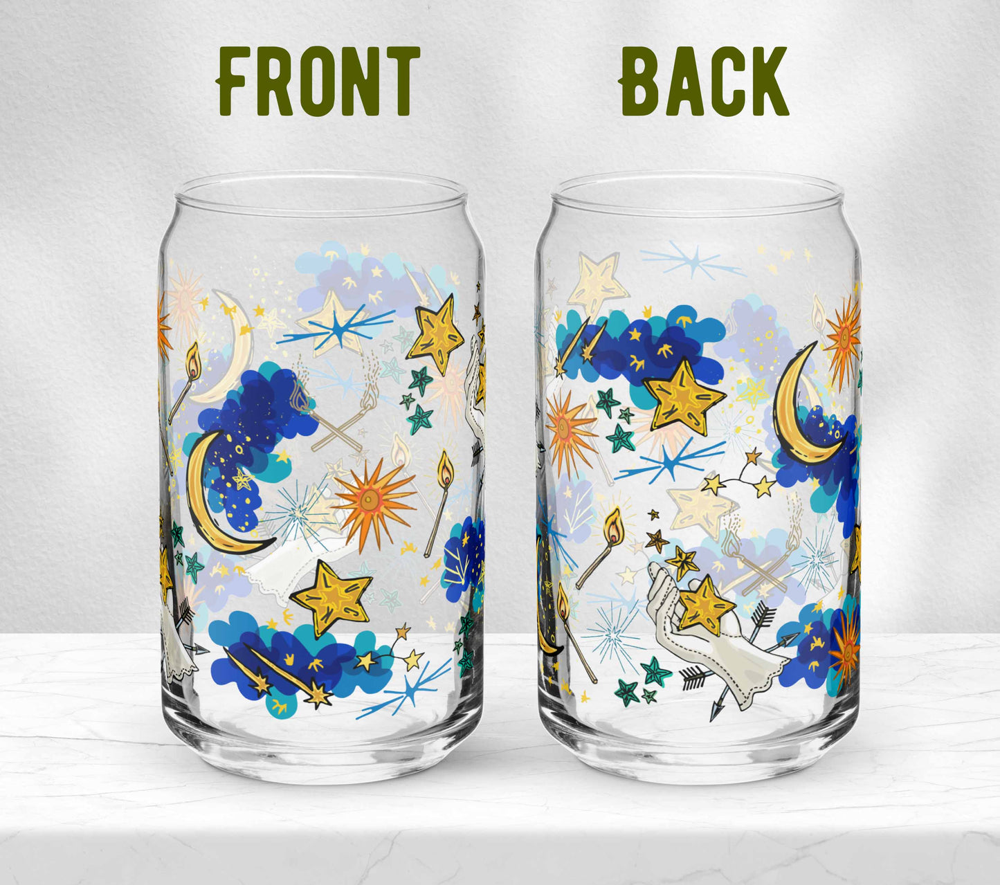 This is a photo showing both sides of the glass without the straw and lid. You can see the illustrations of constellations, the matches, crescent moon and the gloved hand of fate with the crossed arrows.