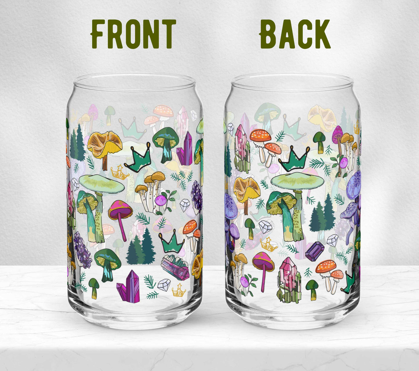 Two glasses sitting on marble. Each one is turned in a different direction to show the front and the back of the design.
