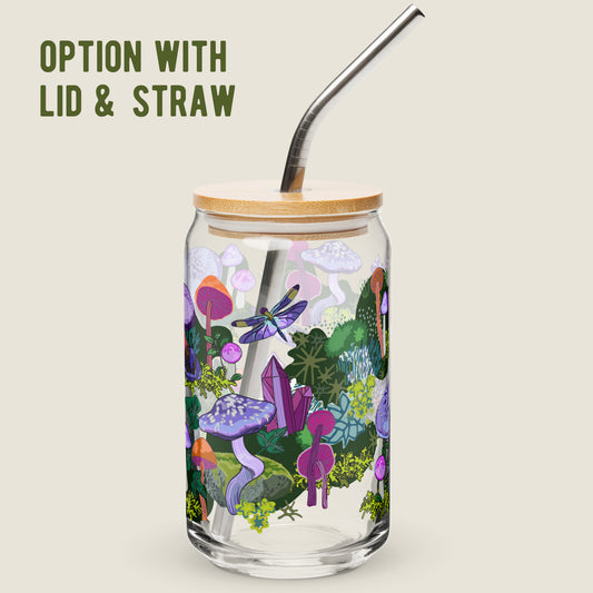 Purple Mushrooms glass tumbler with the lid and straw option on an ivory background. The artwork on the glass is a collection of purple and orange mushrooms, dragonflies, and various mosses nestled among wild ivy. The primary color palette is purples, vibrant oranges, and forest greens.