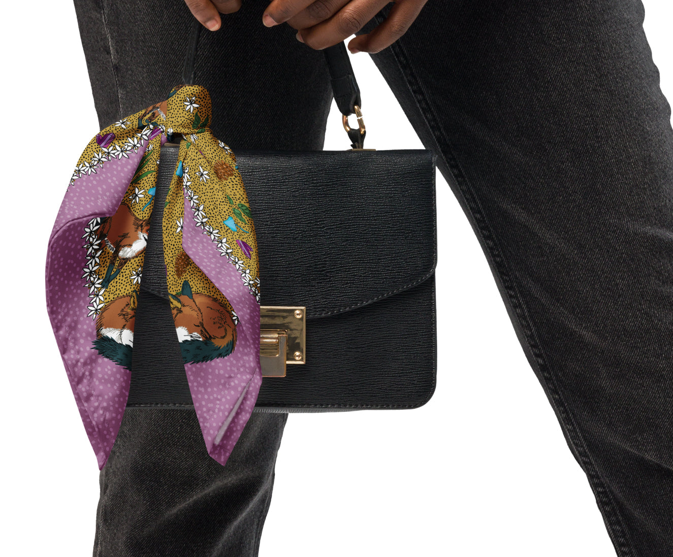 Fox bandana tied to a black purse.