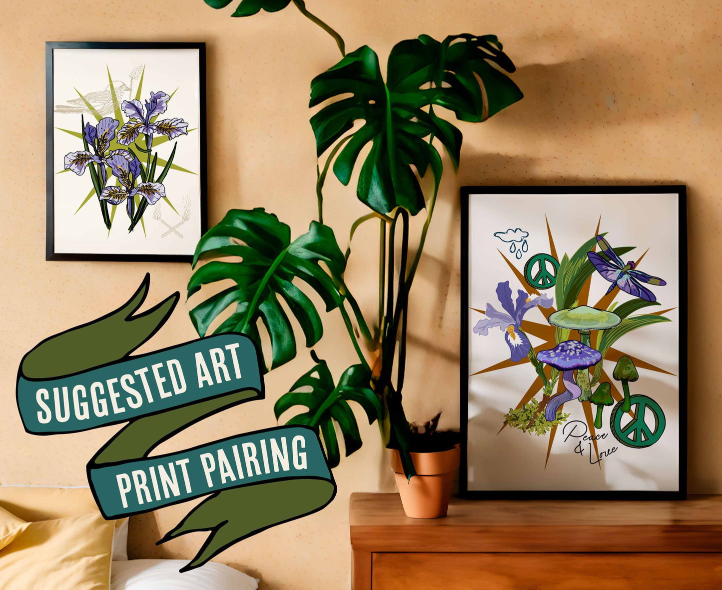 This photo shows a suggested art print pairing. This pairing shows the Wild Iris Mushroom art print in a black frame on a dresser with a plant. The companion print is the Iris & Bird art print, which is in a black frame on the wall.