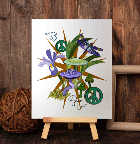 The Peace, Love, and Wild Iris art poster on a wooden easel set against a wood-paneled wall. Featuring a purple dragonfly, wild iris blooms, mystical mushrooms, and peaceful rainfall, this piece is a heartfelt tribute to growth, harmony, and embracing life’s ever-changing journey with an open heart. The dragonfly represents spiritual growth and new beginnings. The mushrooms symbolize resilience and the cycles of life. The rain symbolizes nourishment of our earth and a cleansing of our souls.