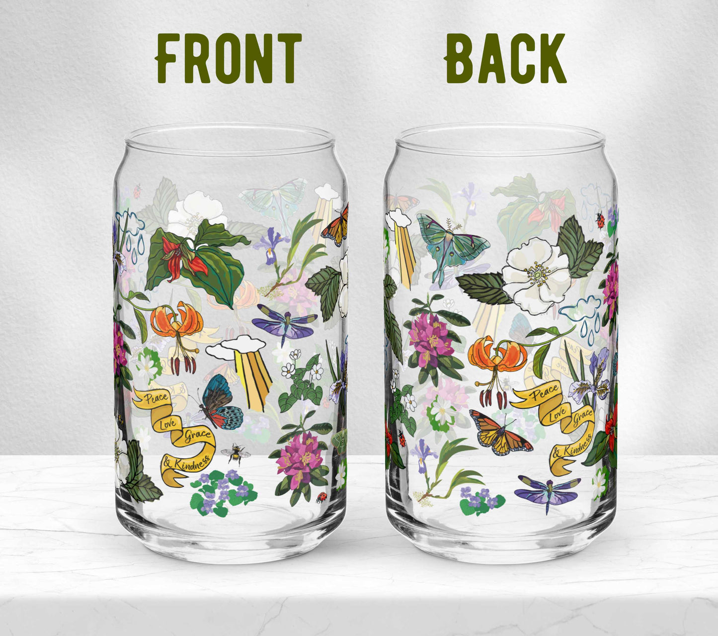 Two glasses sitting on marble. Each one is turned in a different direction to show the front and the back of the design.
