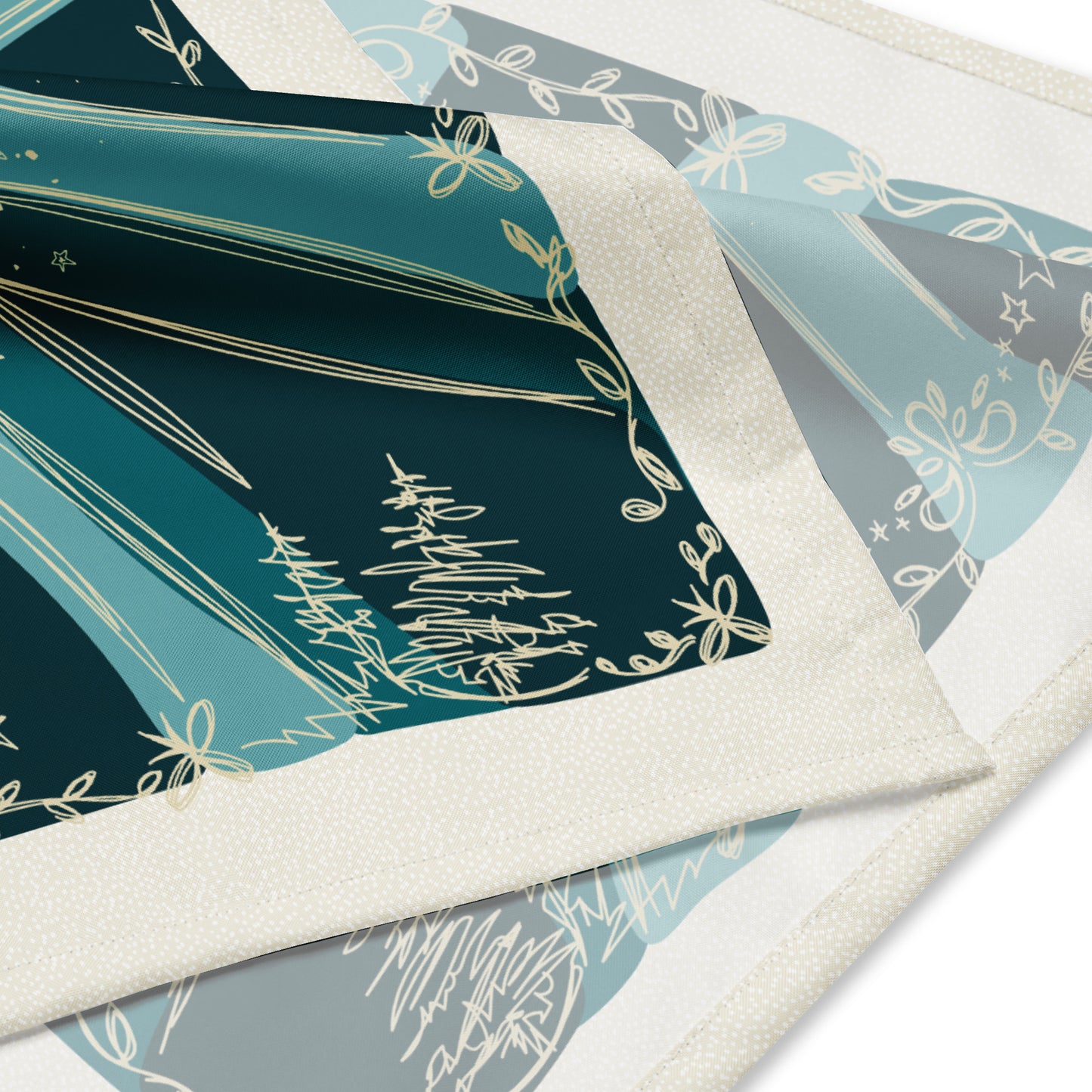This is a close-up shot of the corner of the Blue Moon bandana. t shows the detailed of the illustrated trees, stars, and flourishes.