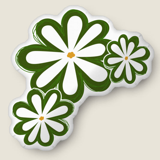 Daisy pillow on an ivory background.