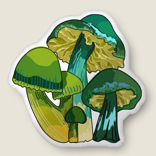 Green mushroom-shaped pillow on an ivory background.