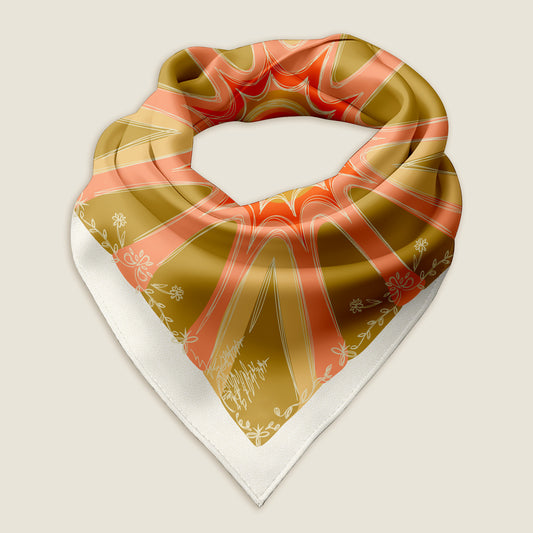 This is an image of the Terra Cotta Sun bandana scarf styled into a wrap showing the hand-drawn artwork of sunrays, sketchy trees, flowers, and stars on a golden yellow background with an ivory border with a white dot pattern. The scarf is laying on an ivory background.