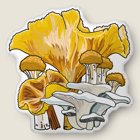 Yellow mushroom-shaped pillow on an ivory background.