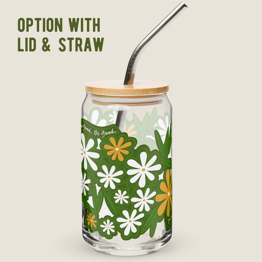  Image of the glass tumbler with the bamboo lid and metal straw option. The artwork has illustrations of white and yellow daisies, leaves, and the phrase "Do Good. Be Good." woven between them. These illustrations have an organic green shape around them.