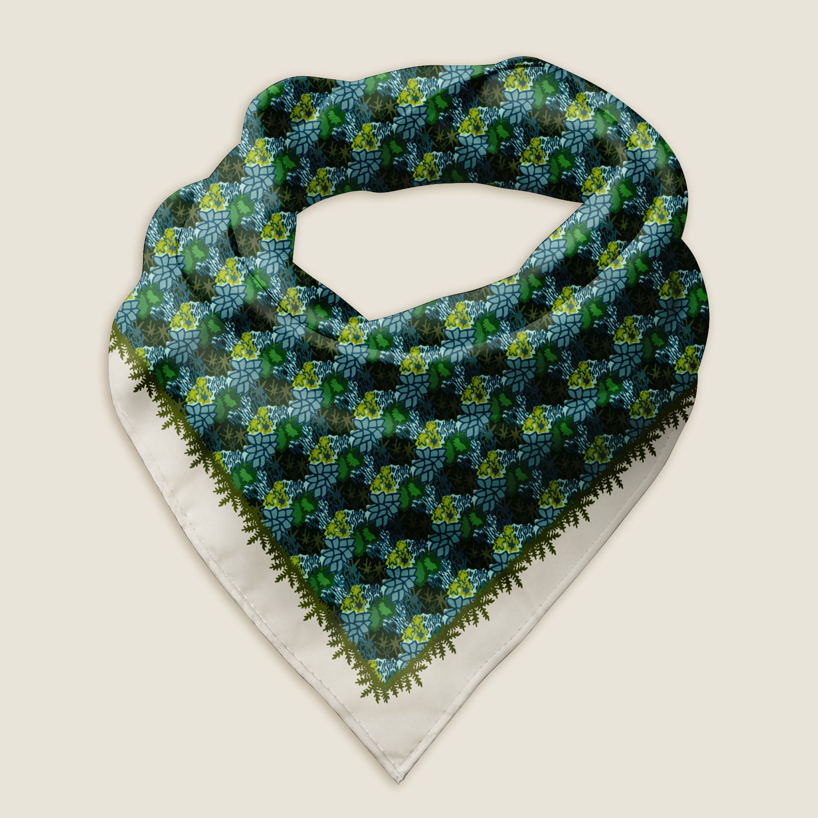 The moss mushroom bandana scarf styled as a wrap shows the details of the hand-drawn artwork, which includes a variety of mosses in earthy blues and greens. Behind the scarf is an ivory background.