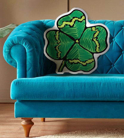 This photo shows the pillow on a bright blue couch.
