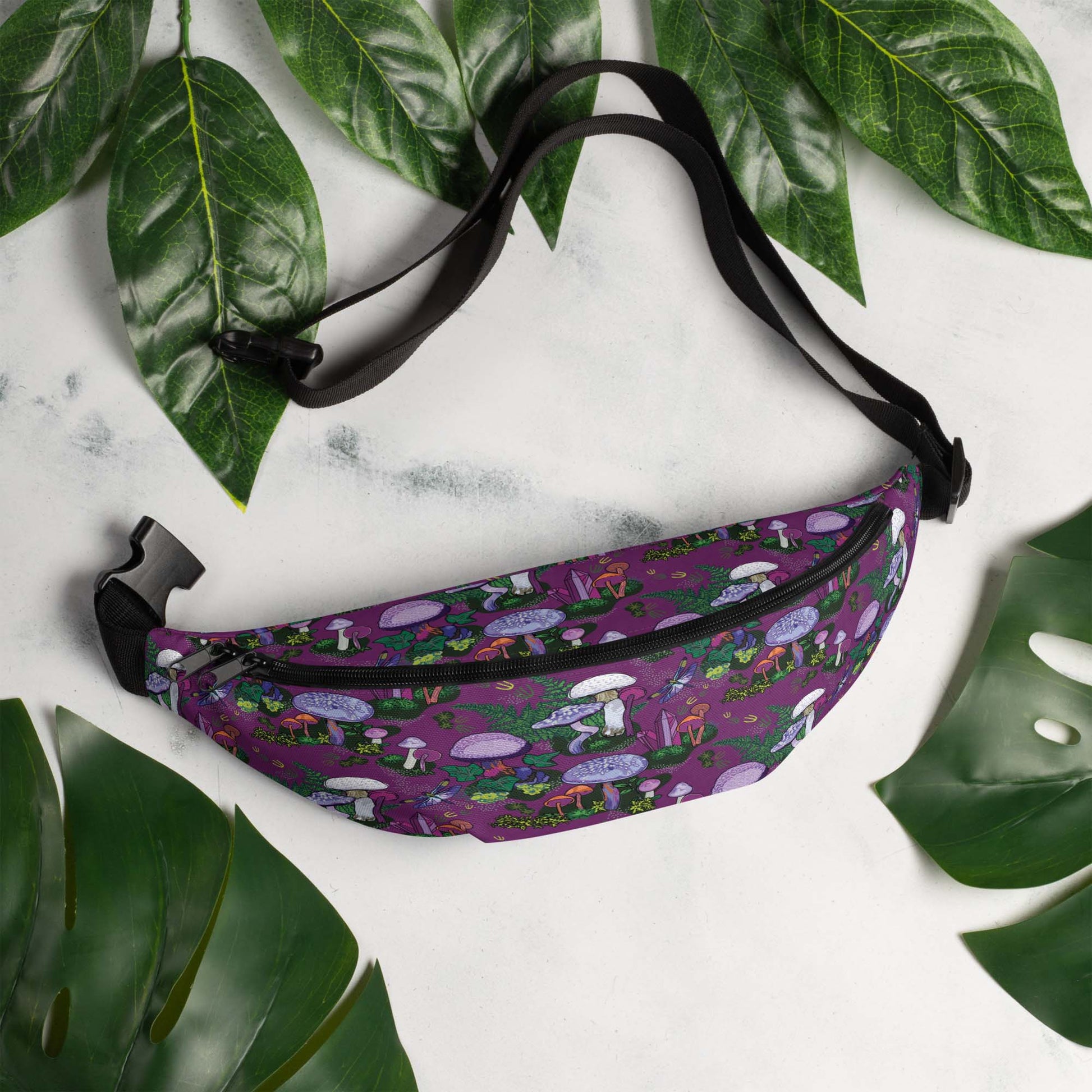 Purple Mushrooms Hip Pack on marble surrounded by leaves | Hiking Sling Bag | Festival Gear