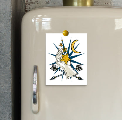 This is a close-up image the small Lucky Stars art print hung on an ivory vintage refrigerator.