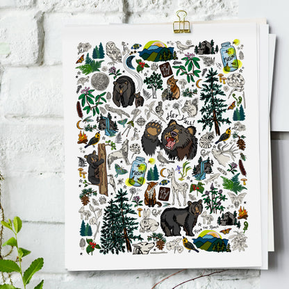 Mountain Hikes art print hanging from a white bring wall with gold clips.