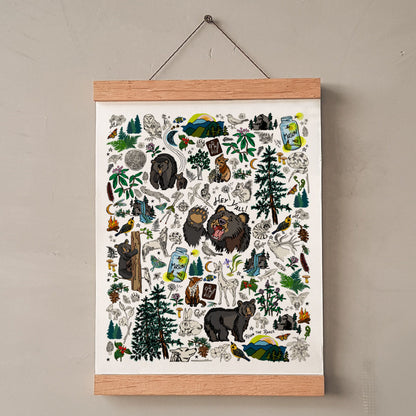 Mountain Hikes art print hung with wooden wall display strips.