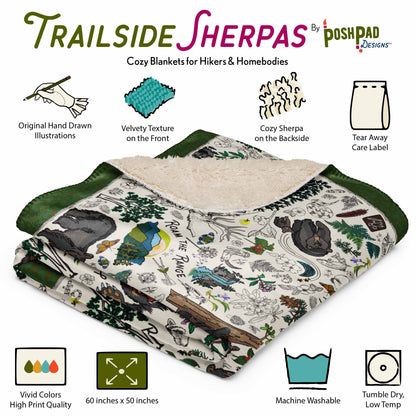 Folded blanket with nature-themed design, surrounded by illustrations of the blanket's features for the Trailside Sherpas brand. The features include original hand-drawn artwork, velvety textured front side, fluffy sherpa texture on the backside, tear away tag, vivid printing, size is 60 x 50 inches, machine washable, and tumble dry on  a low temp setting.