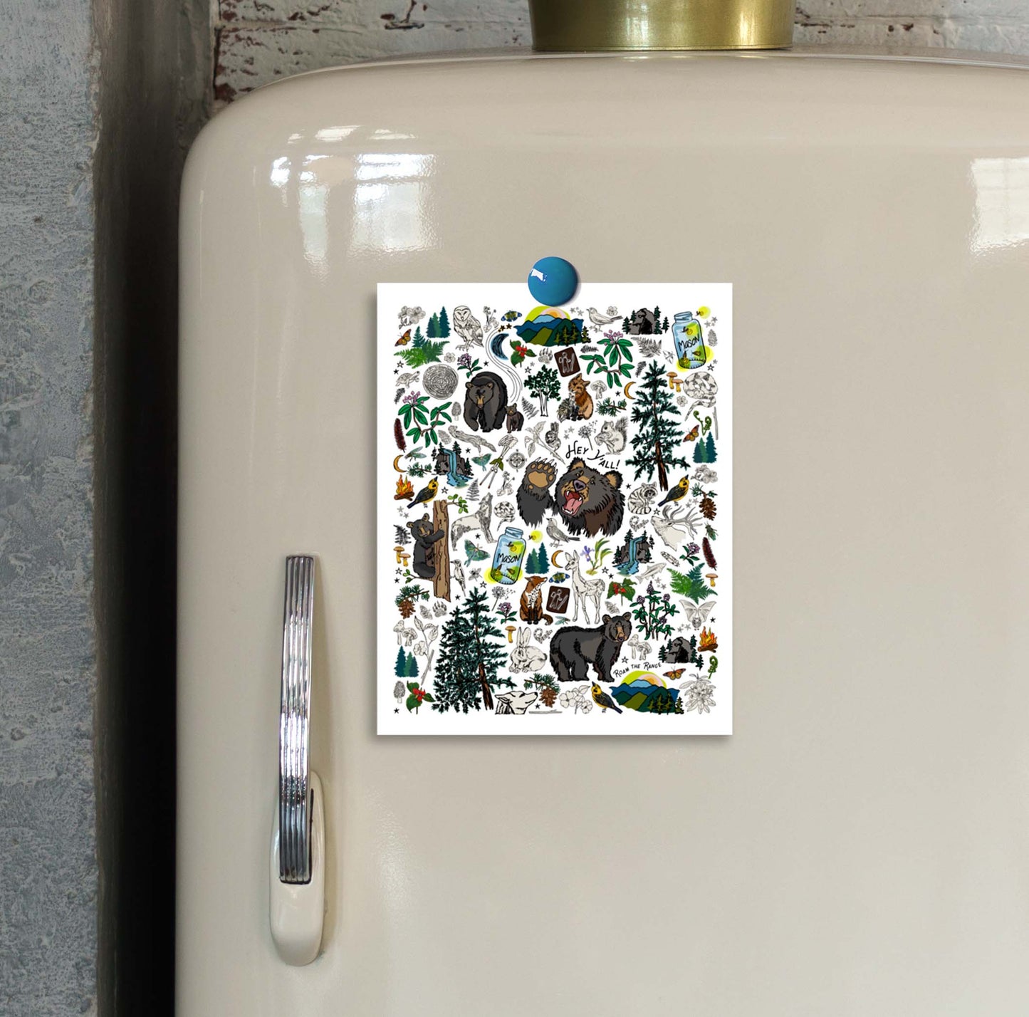 This is a close-up image the small Mountain Hike's Path art print hung on an ivory vintage refrigerator.