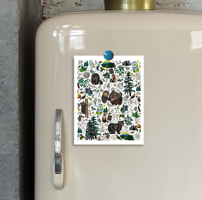 This is a close-up image the small Mountain Hike's Path art print hung on an ivory vintage refrigerator.