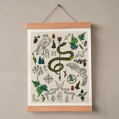 Peace Out in the Woods art print poster hung in a wood wall hanger. The artwork has illustrations of eagles, snakes, ferns, north star compass, pinecones, pine trees, an arrow, feathers, peace sign, and forest icons. 