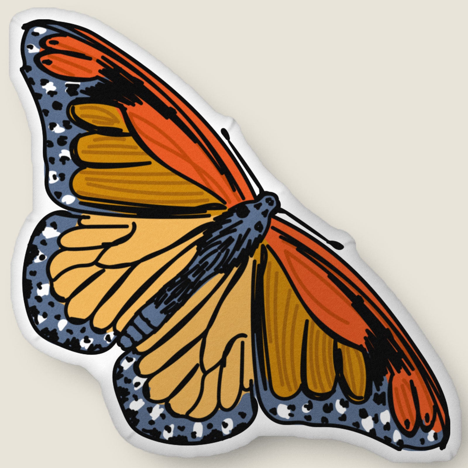 ​​A velvety, plush butterfly-shaped pillow in rich red and gold tones rests against an ivory background. Hand-drawn bohemian details and soft, sculpted texture make this cozy accent feel both artistic and nature-inspired.