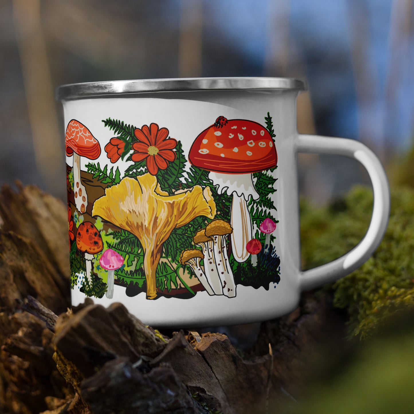 Red mushroom camp mug on a tree stump.
