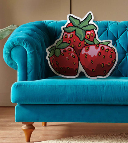 This is an image of the shaped pillow on a blue couch.