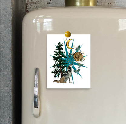 Wolf Moon and Moths art print hung on a refrigerator door with a magnet.